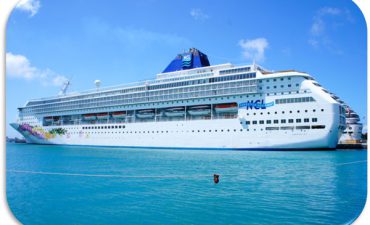 a large NCL cruise ship in the water