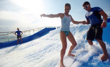 FlowRider woman standing on Surfboard