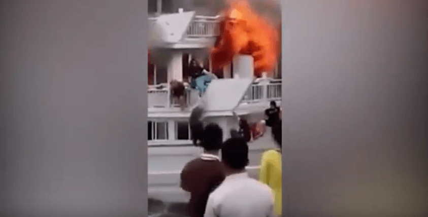 Tourists jump for their lives after cruise ship catches on fire in Ha Long Bay