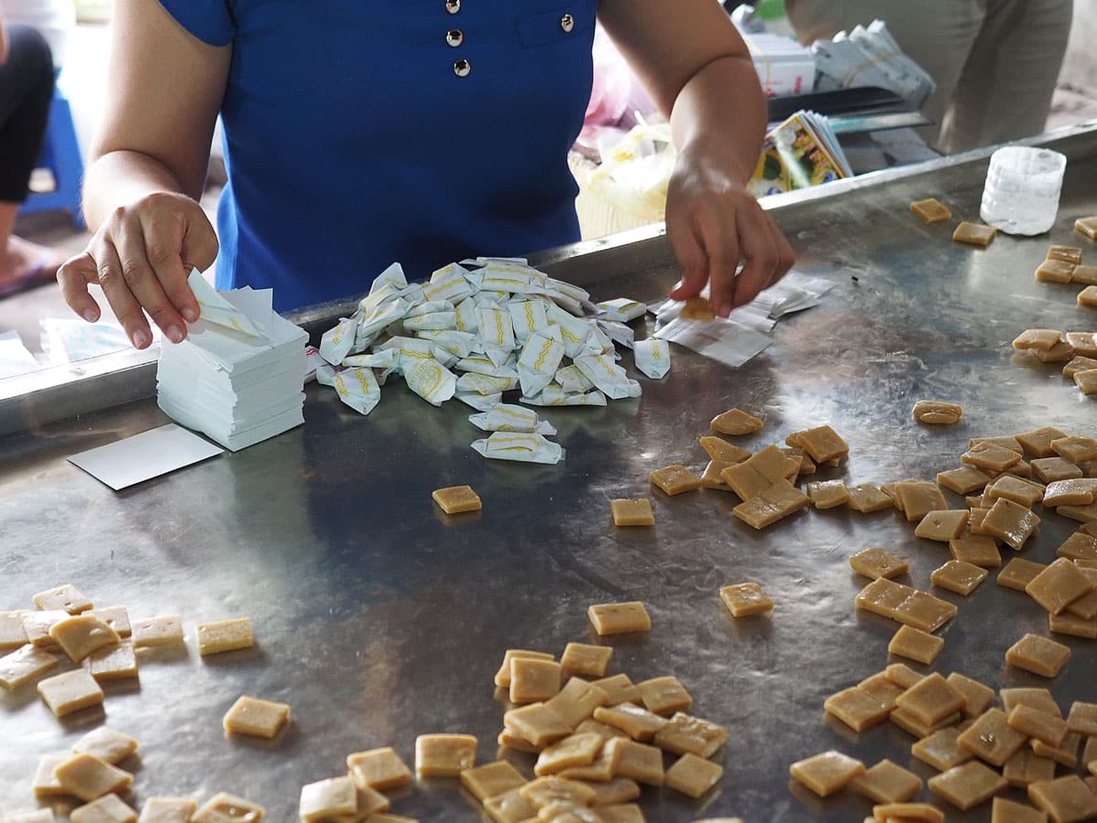 Making coconut candy on the Mekong