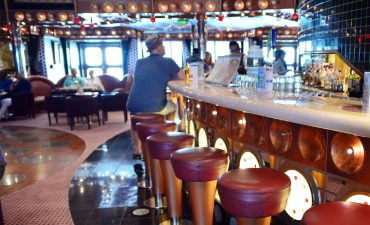 man at the bar on a cruise ship