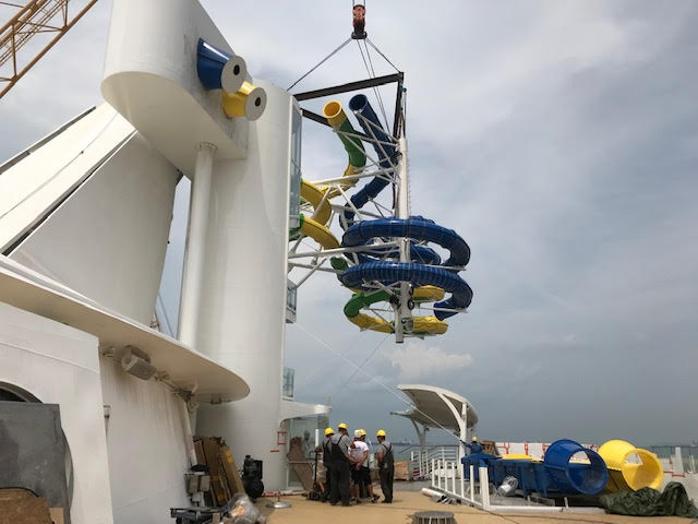 The slide being lowered onto Voyager of the Seas
