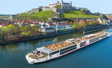 Cruise ship beside a town