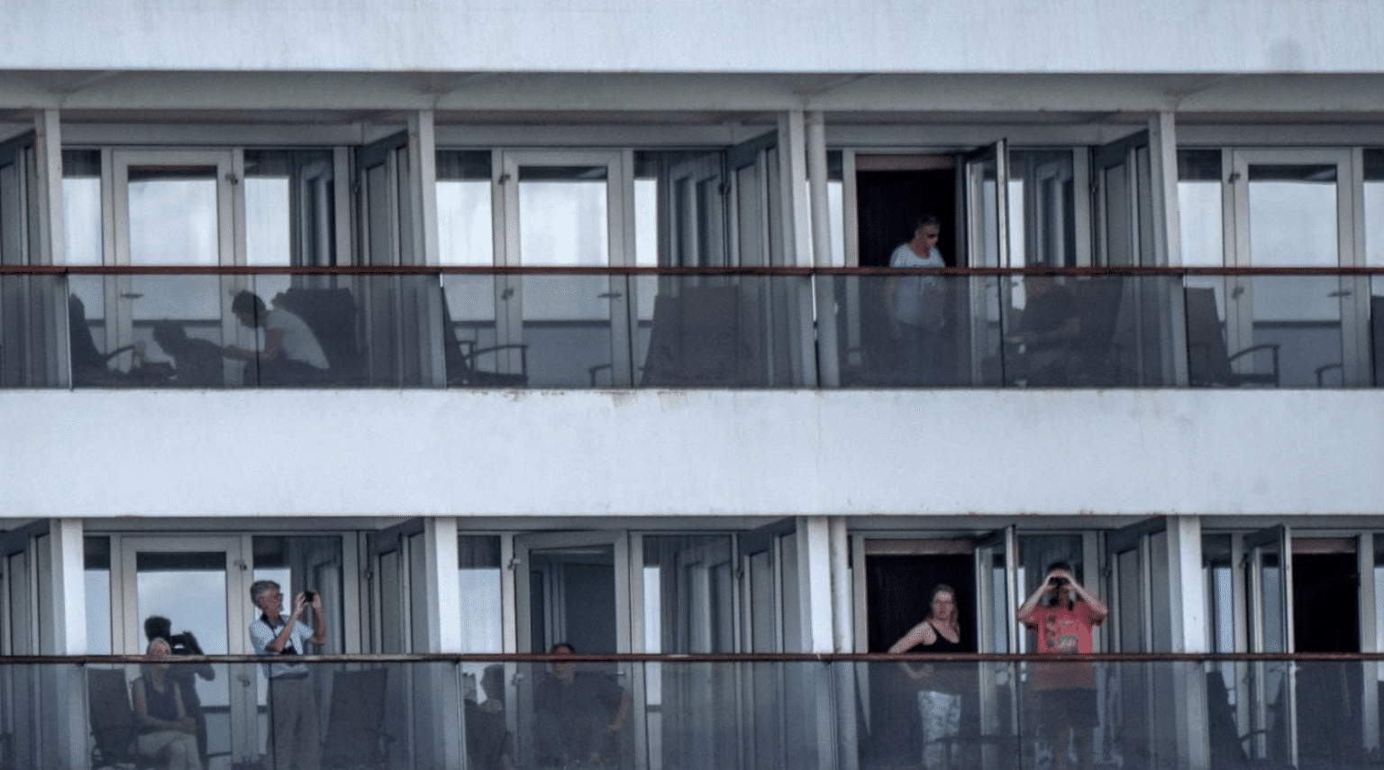 Free at last: Aussies on Zaandam and Rotterdam on their way home.