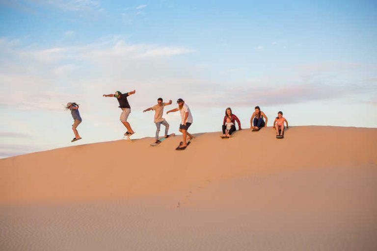 Boarding down the Port Stephen's sand dunes