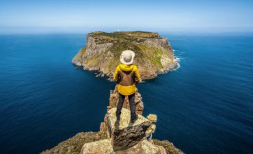 A man on top rocks