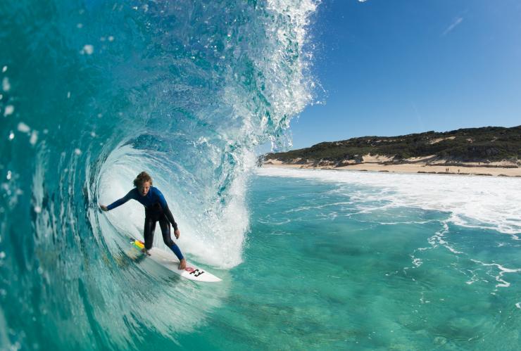 Surfer surfing on the waves