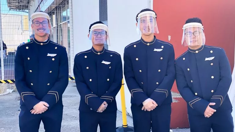 Crew on Ponant with face shields