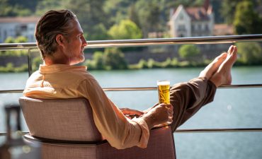 A man chilling while drinking