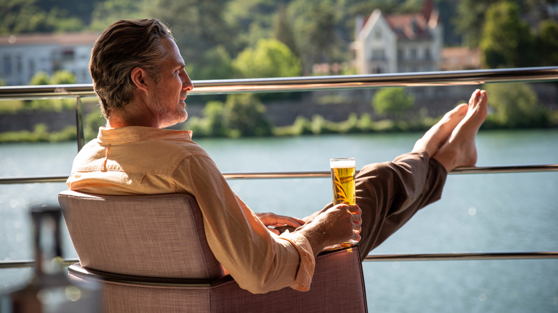 A man chilling while drinking