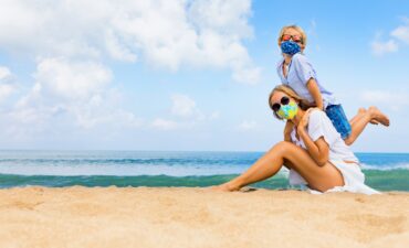 mother and child wearing masks