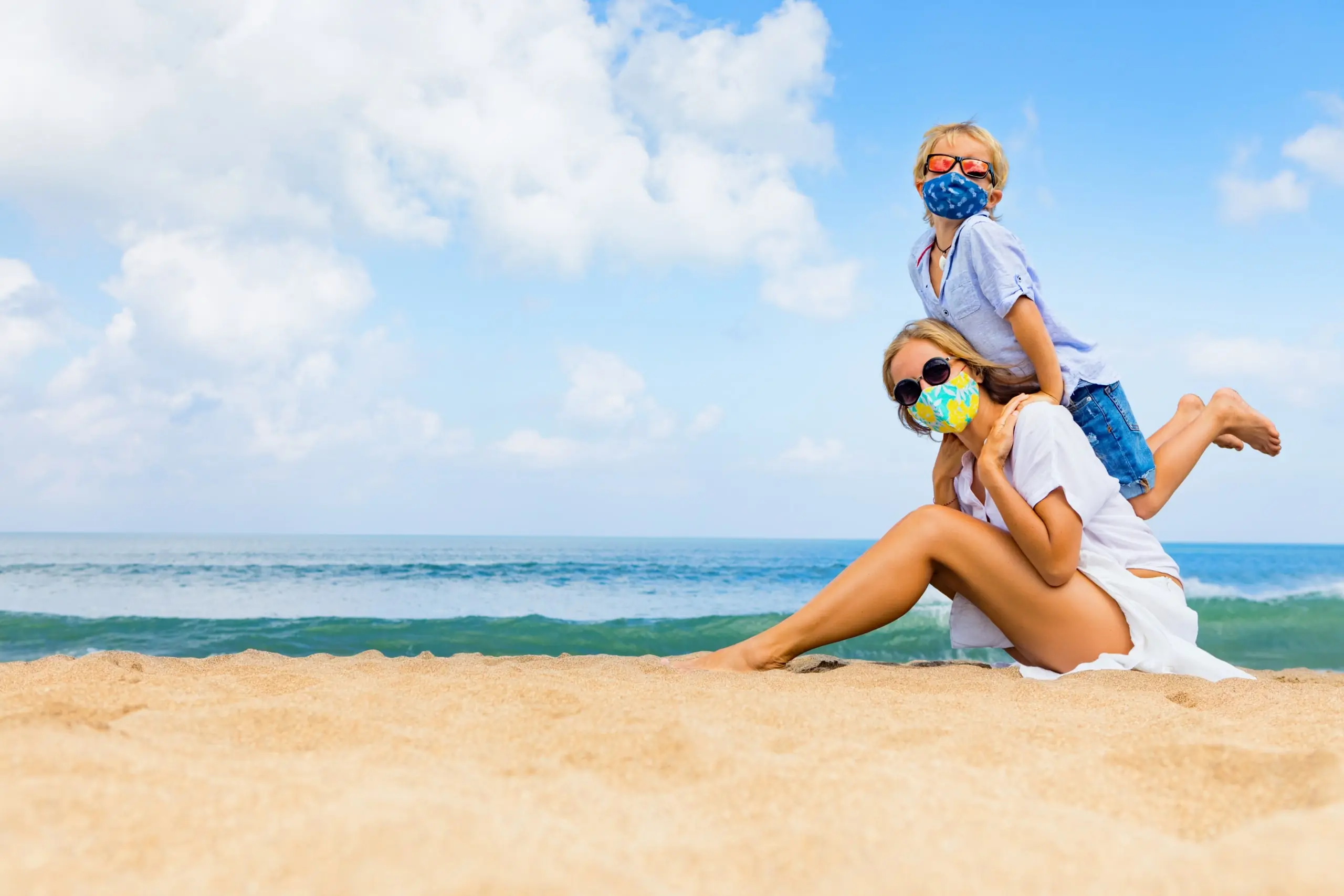 mother and child wearing masks