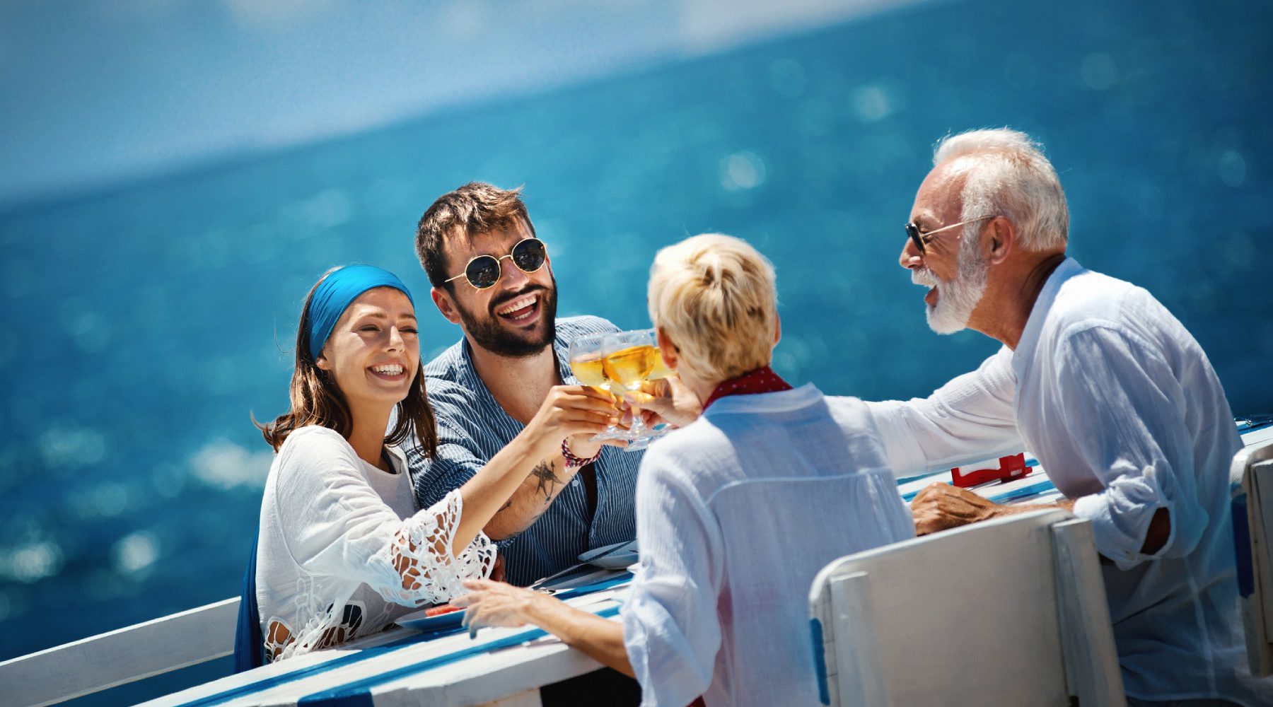 Two couples onboard Azamara drinking