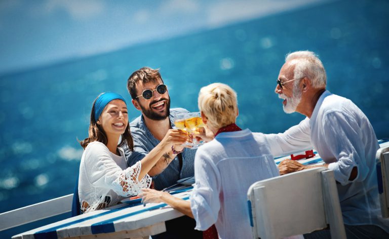 Two couples onboard Azamara drinking