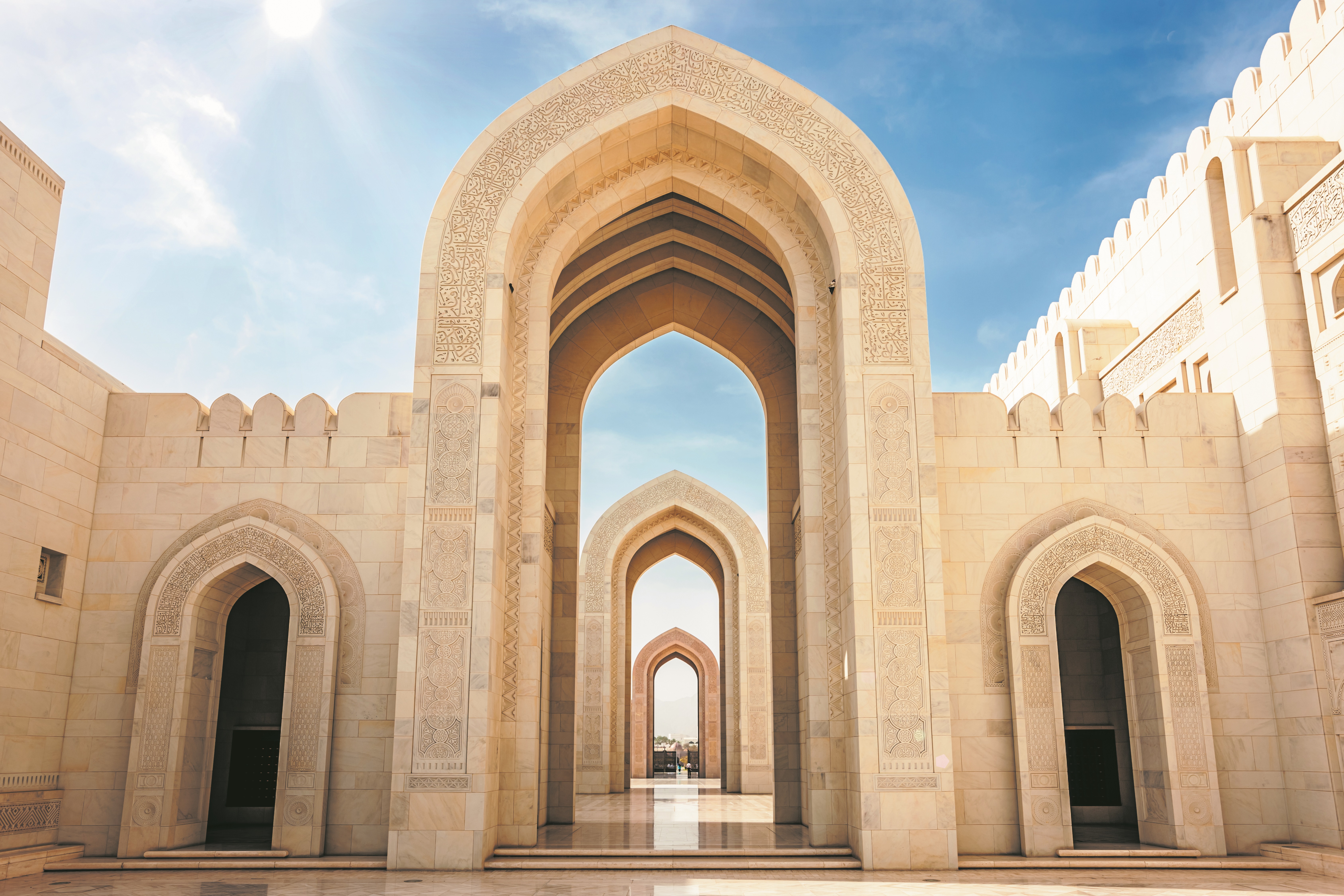 GettyImages 174641715 Arches Sultan Qaboos Grand Mosque MuscatOman SCALED