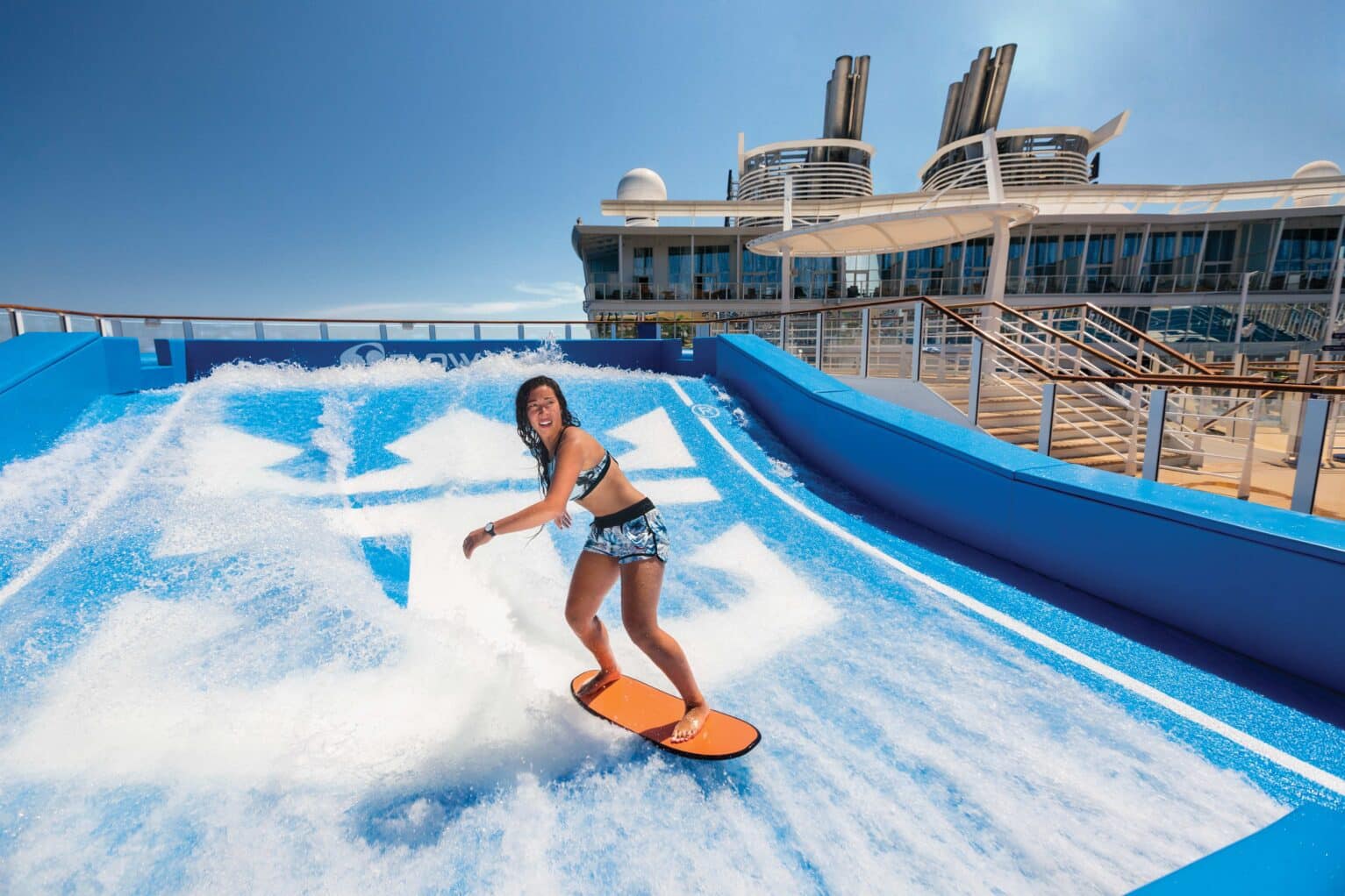 Woman onboarding surfing