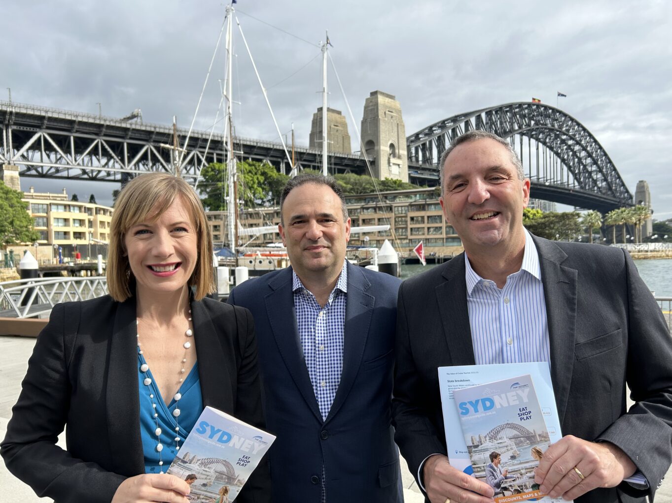 (Left to right) NSW Minister for Transport Jo Haylen, CLIA managing director Joel Katz and Port Authority of NSW CEO Phil Holliday show off the new Sydney Travel Guide.