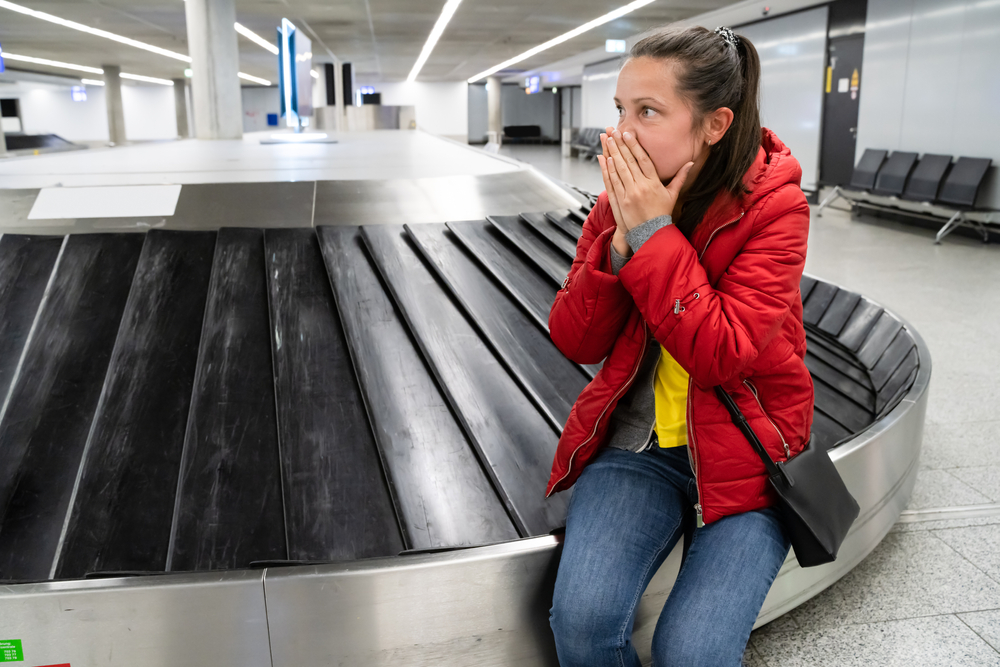 Upset woman who lost her baggage while traveling by plane