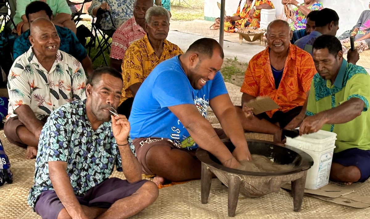 Island elders make kava before a dinner at 
