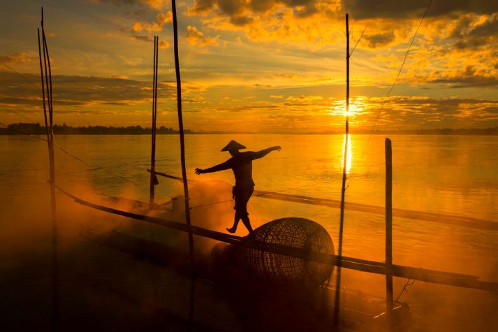 A fisherman on the Mekong
