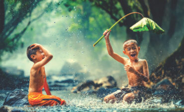 Childred playing in the river