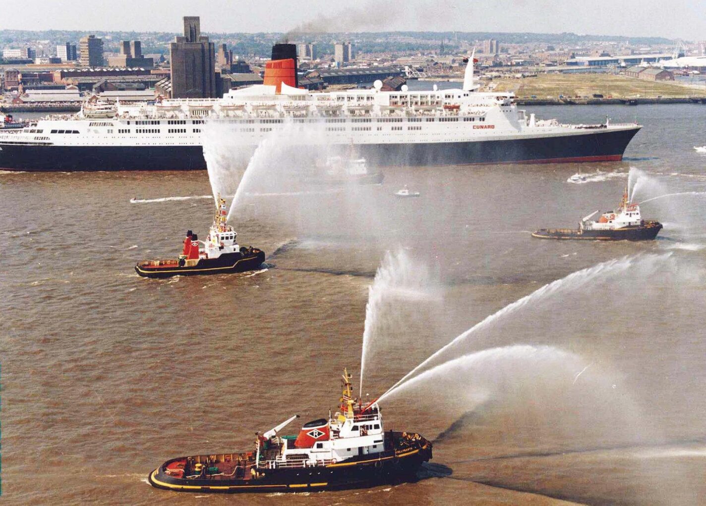 The fanfare of QE2's naming ceremony in 1990 