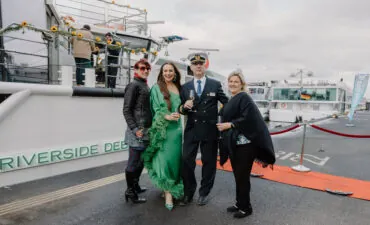 The captain of Riverside Debussy and guests at the christening of the ship in Amsterdam.