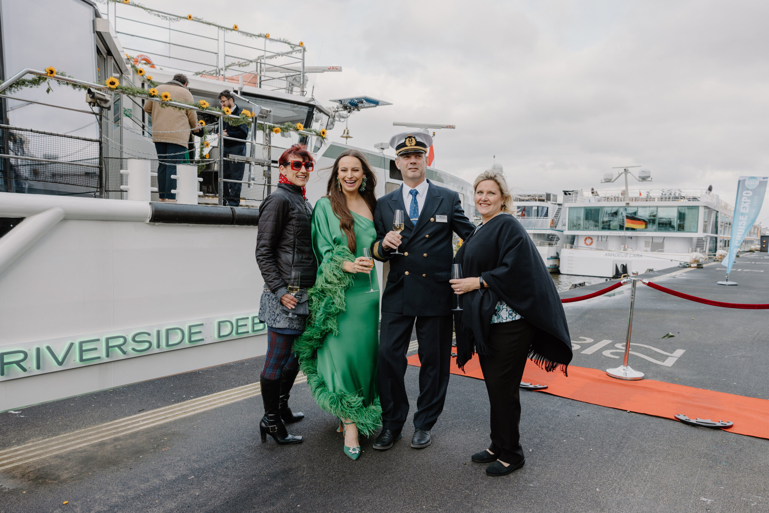The captain of Riverside Debussy and guests at the christening of the ship in Amsterdam.
