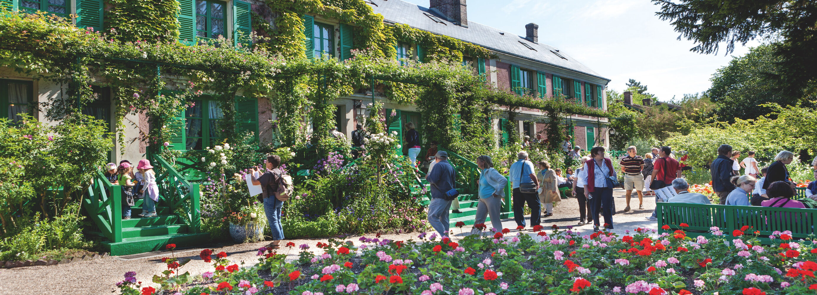 Tourists visit Claude Monet's home and gardens in the town of Giverny in France.