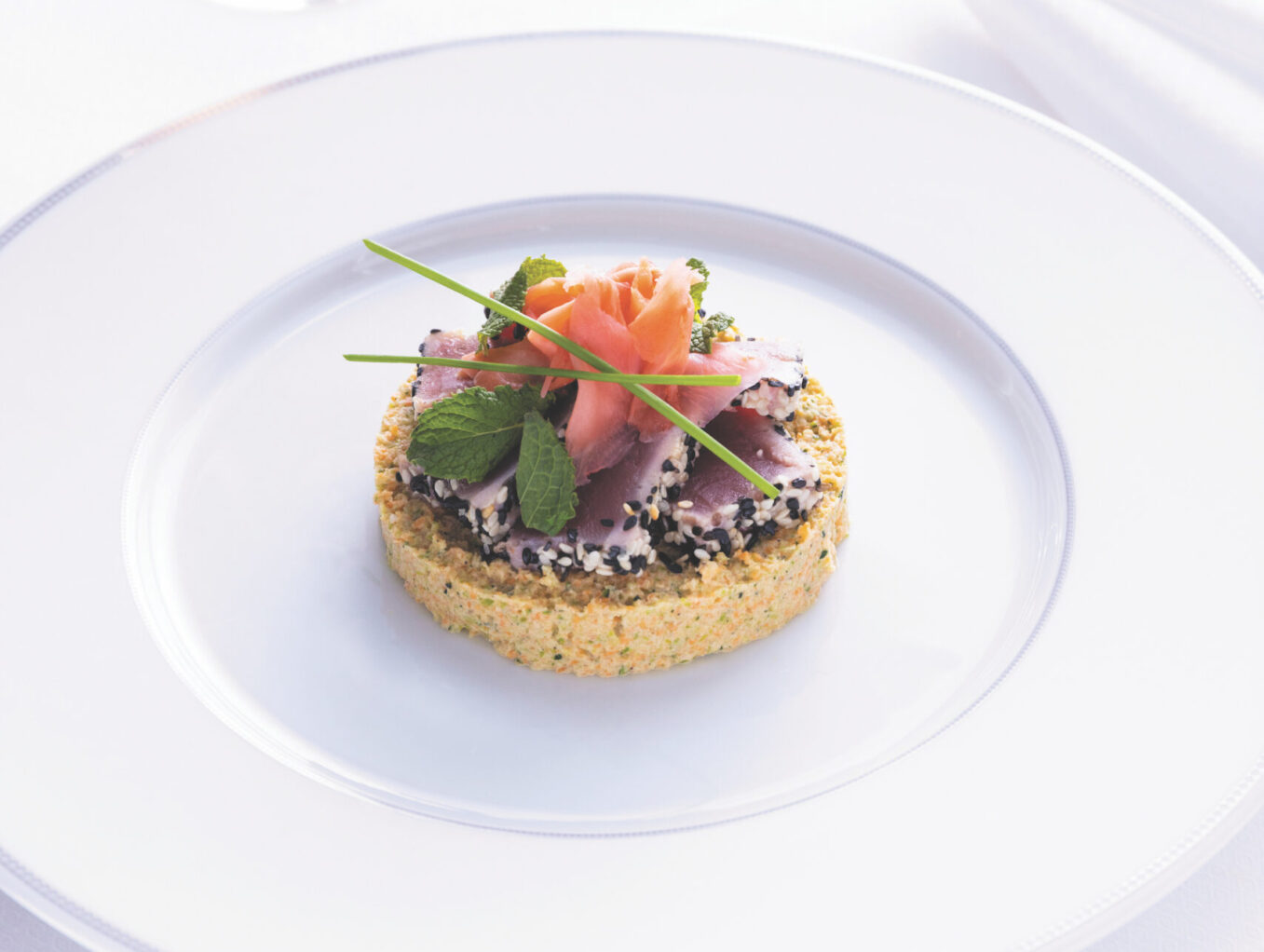 A picture of crab tian on a plate on Regent Seven Seas cruise food trends 2024