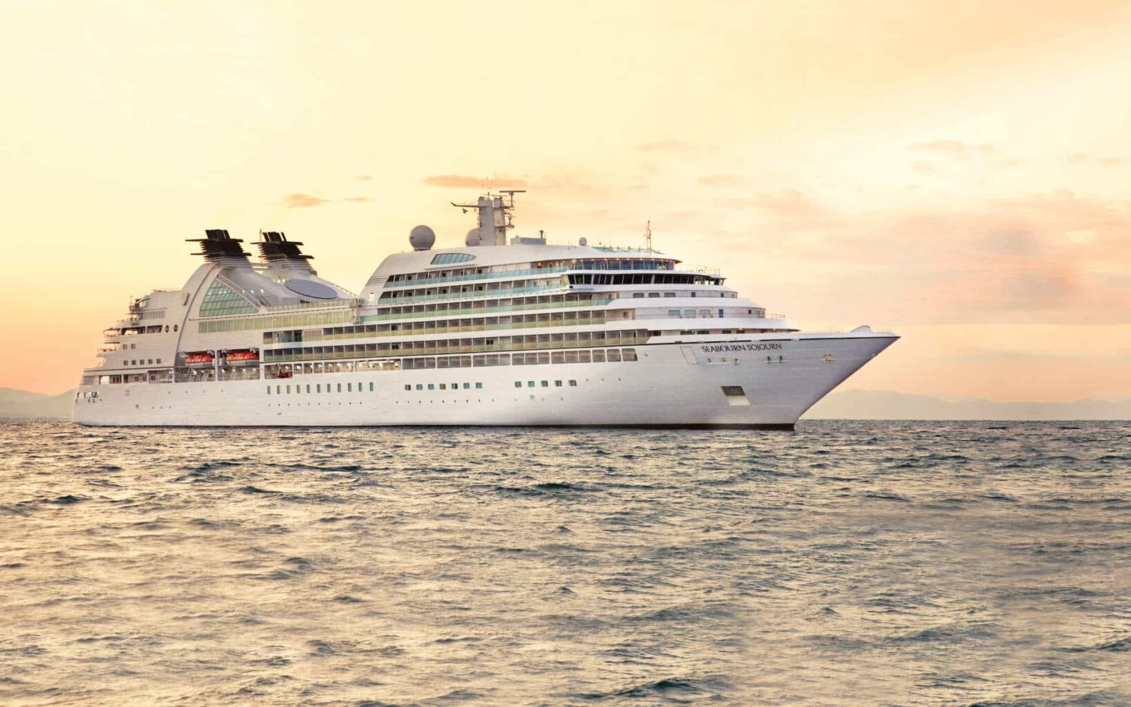 The Seabourn Sojurn cruise ship on the water at sunset
