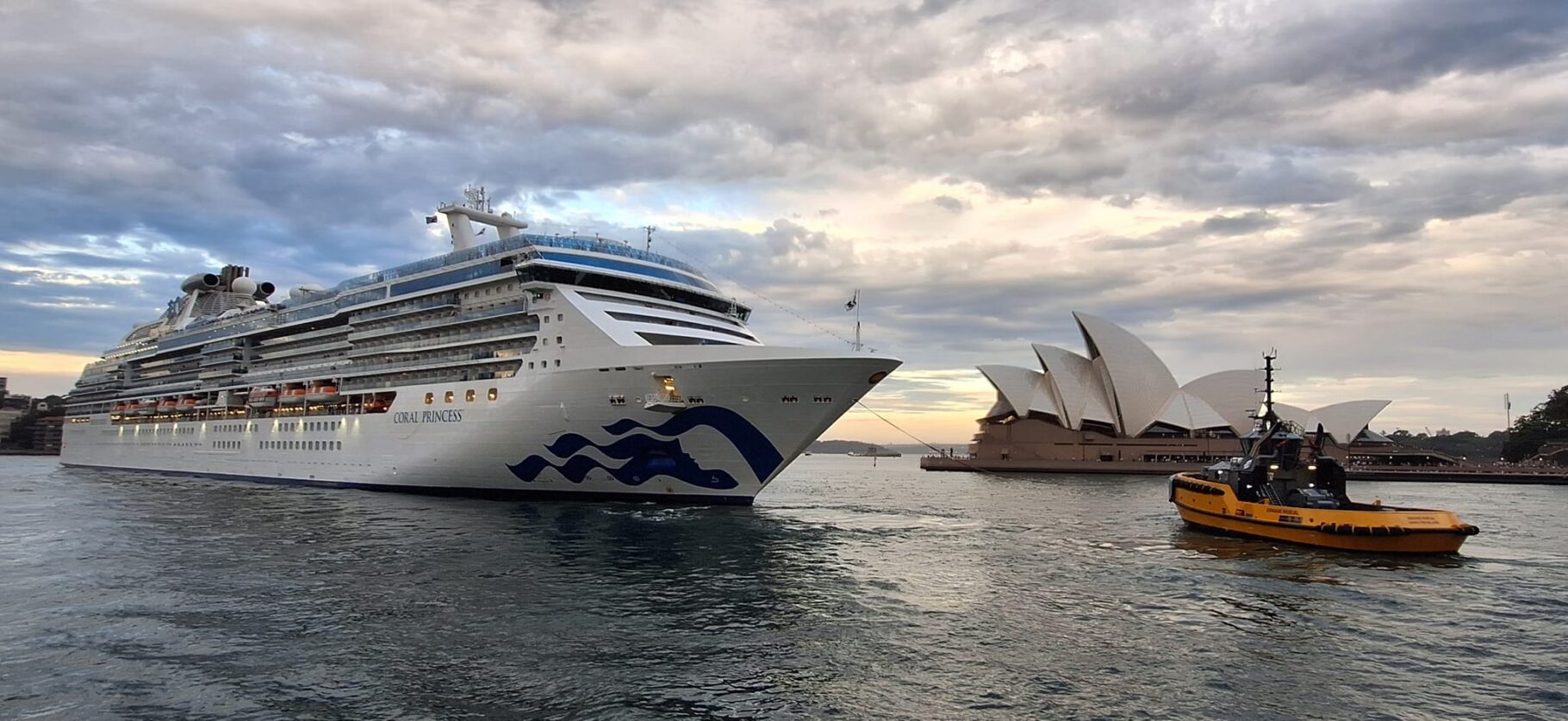 Coral Princess in Sydney with the Sydney Opera House in the background.