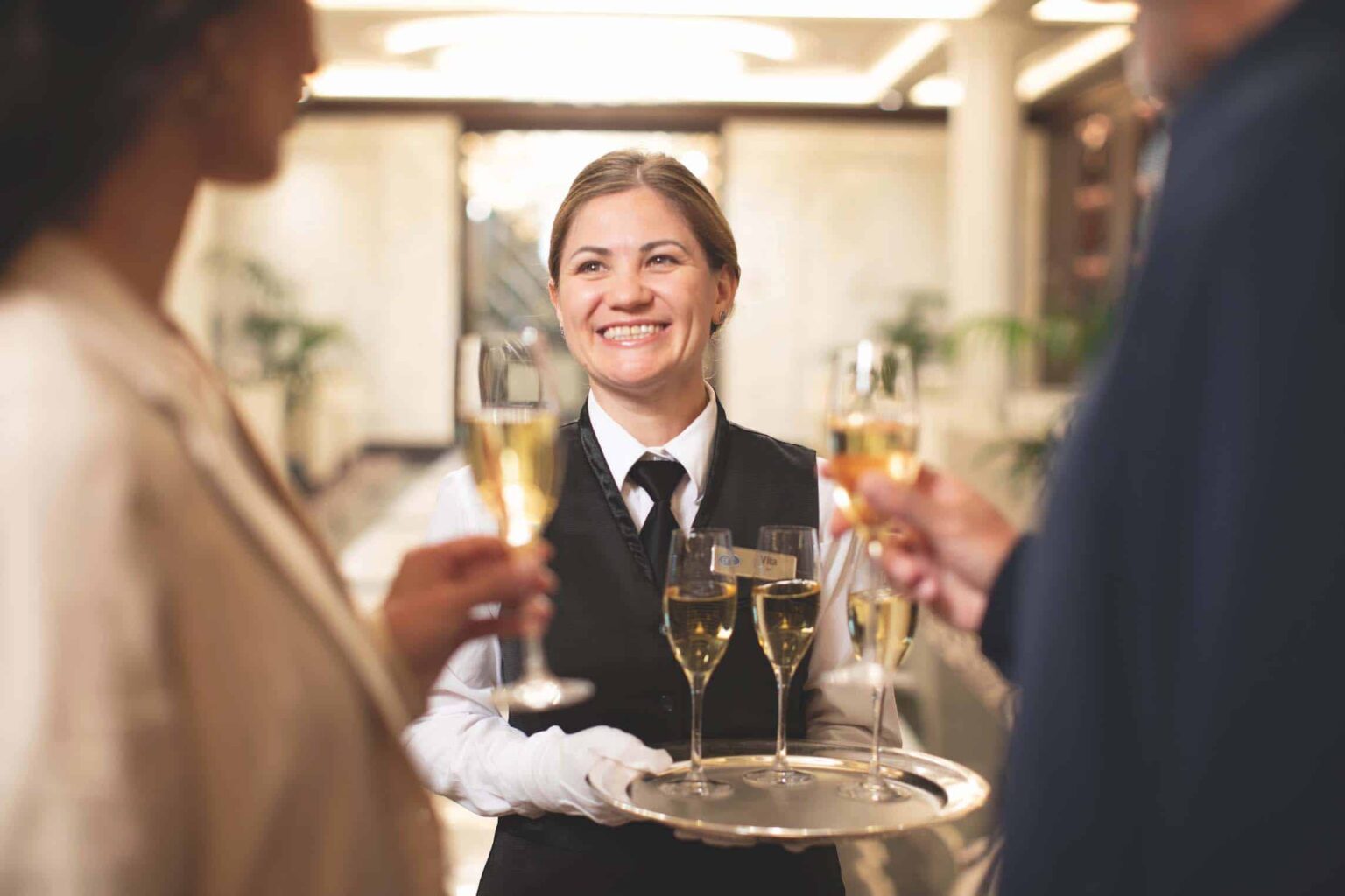 Guests are welcome aboard Regent Sevens Seas with a glass of champagne.