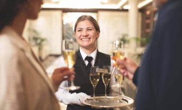 Guests are welcome aboard Regent Sevens Seas with a glass of champagne.