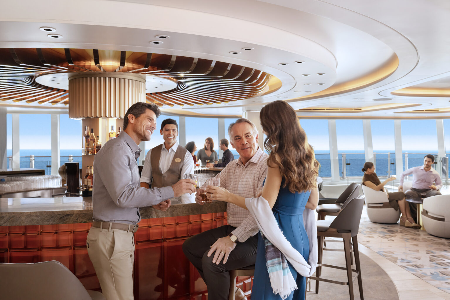 The Whiskey Bar on Norwegian Cruise Line Prima class shows a barman serving drinks to guests.