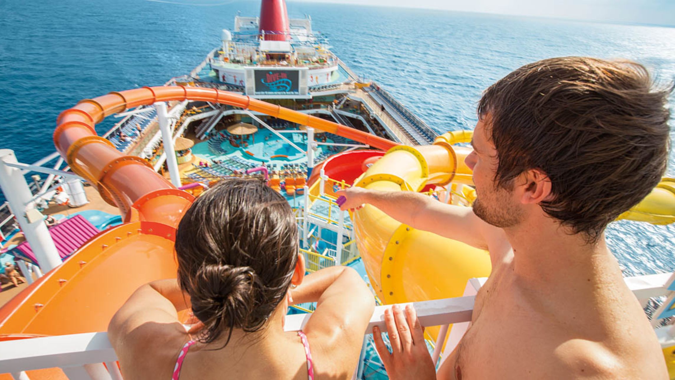 A couple on the Carnival Splendor with waterslide