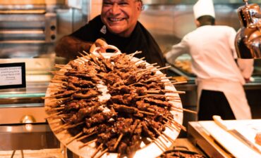 Mark olive with his best grilled meat on stick