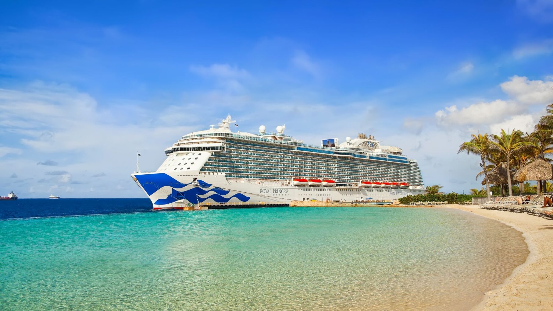 A Princess cruise ship on a Caribbean beach.