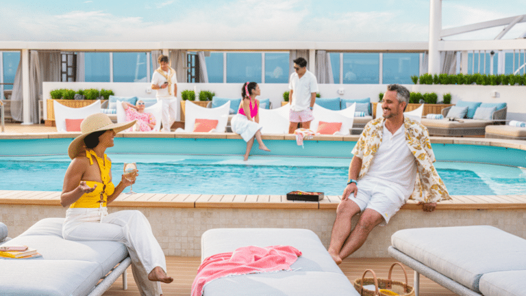 a group of people sitting on a pool deck
