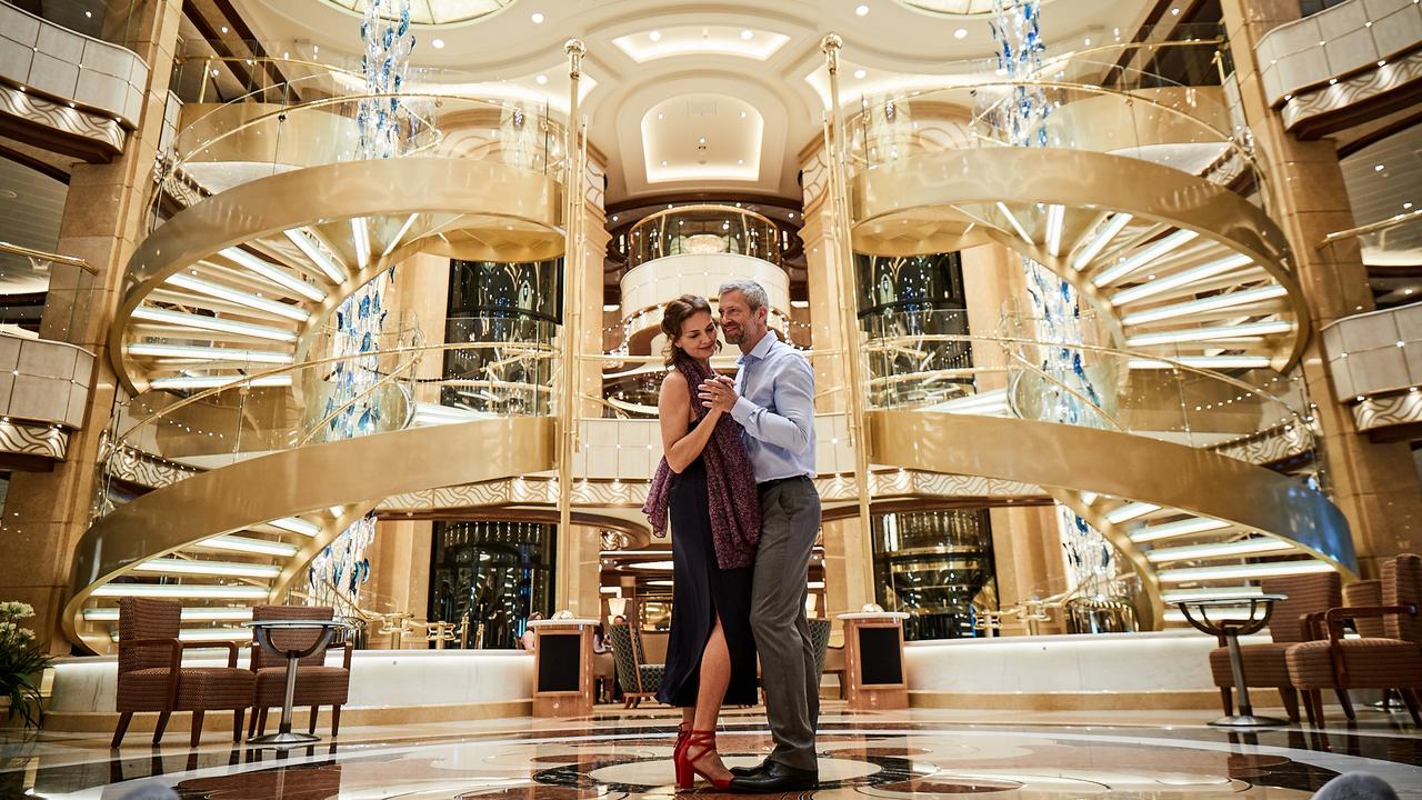 A couple dancing in the atrium of the Crown Princess