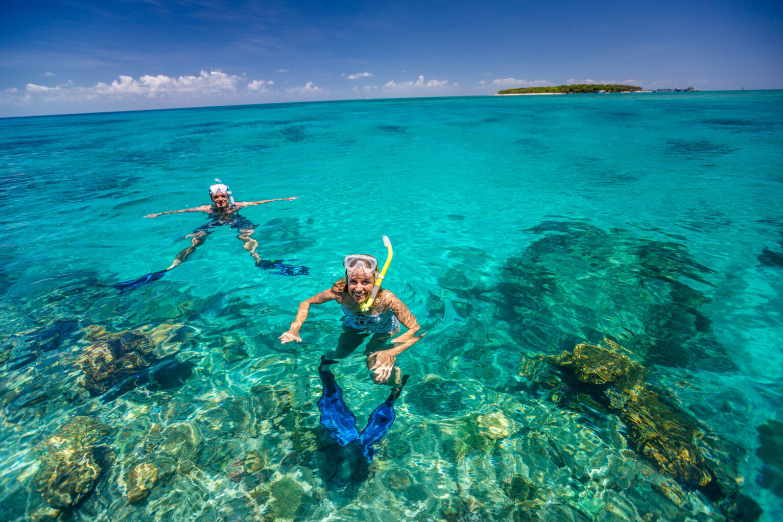 A couple snorkelling in Green Island