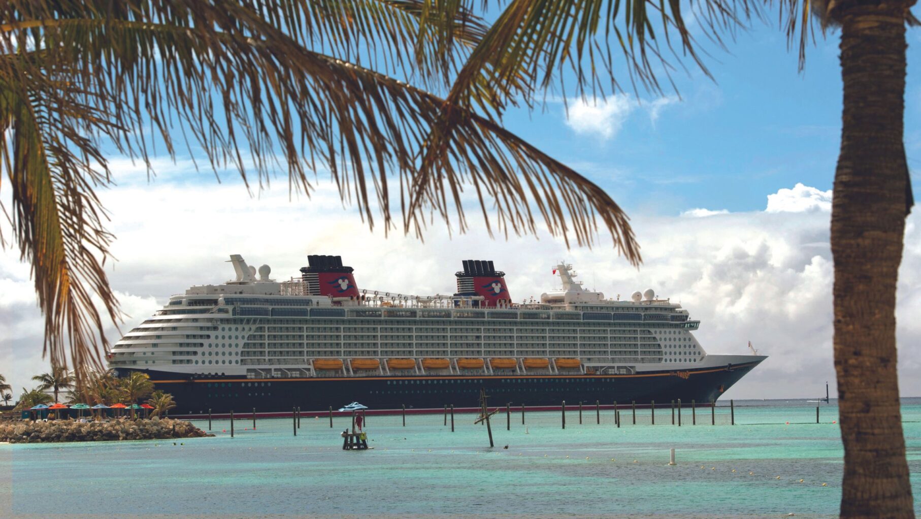 A Disney Cruise Line ship docked in the Caribbean