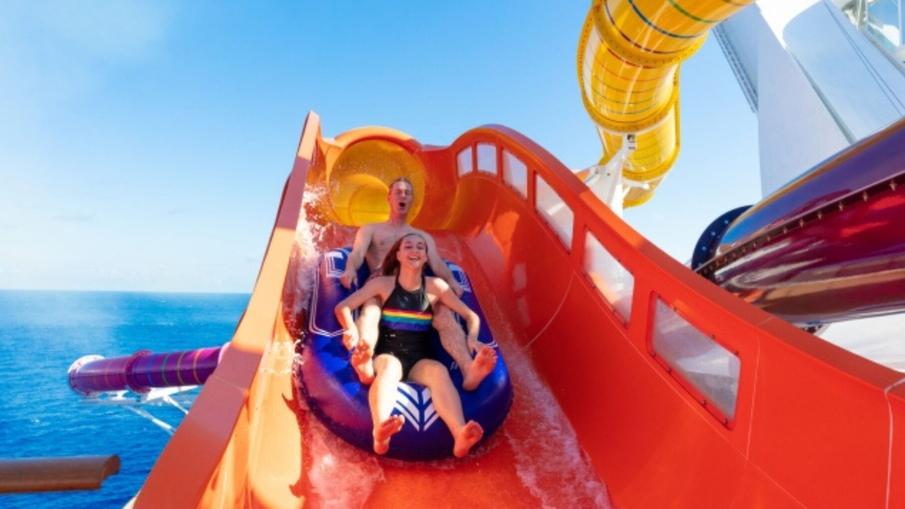 Kids enjoy the Royal Caribbean waterslides with their parents.