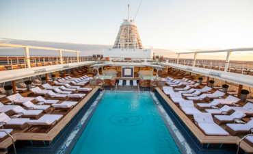 A luxurious pool at the Seven Seas Splendor world cruise