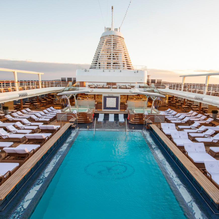 A luxurious pool at the Seven Seas Splendor world cruise