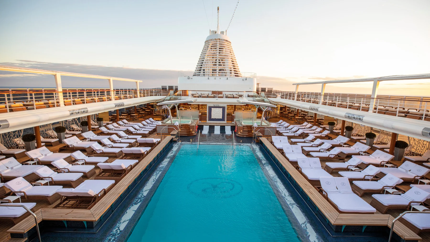 A luxurious pool at the Seven Seas Splendor world cruise