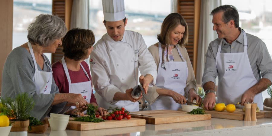 Viking River Cruises cooking onboard with a chef and fish