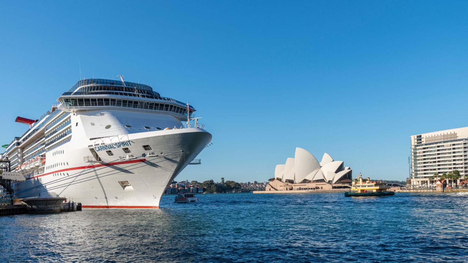 A cruise shop docked in Sydney harbour.