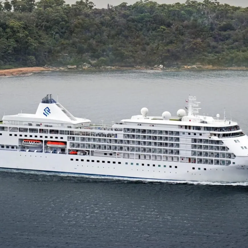 The Silver Muse in Sydney Harbour with the Sydney Harbour Bridge in the background