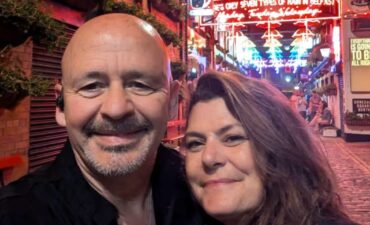 The smiling couple who got engaged in Belfast.